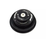 Black integrated threadless bicycle headset with visible branding and model details on the top bearing cover.