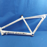 A white Claud Butler alloy bike frame for 700C wheels displayed on a blue background.