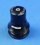 Black FSA Bicycle Threadless Headset with Spacers laid out on a blue background.