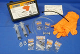 An IceToolz bleed kit for hydraulic disc brakes, including a pair of orange gloves, a syringe, adapter, PU tubes, tubing clips, and a cable tie.