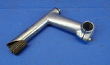 Silver steel handlebar quill stem for bicycles, showing signs of wear and two bolts on the column.